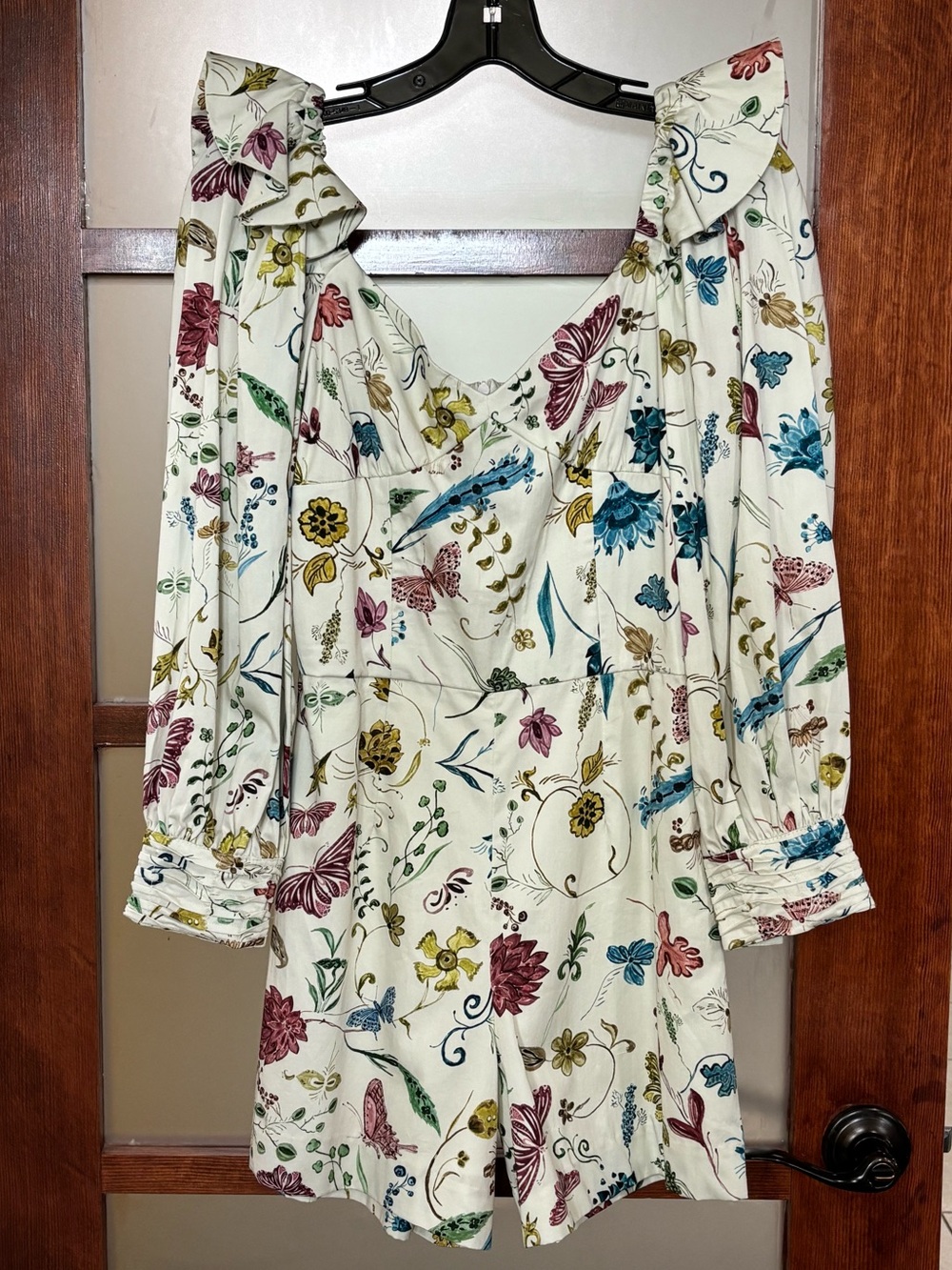 Atelier 1756 Cream Romper with Ruffle Shoulders